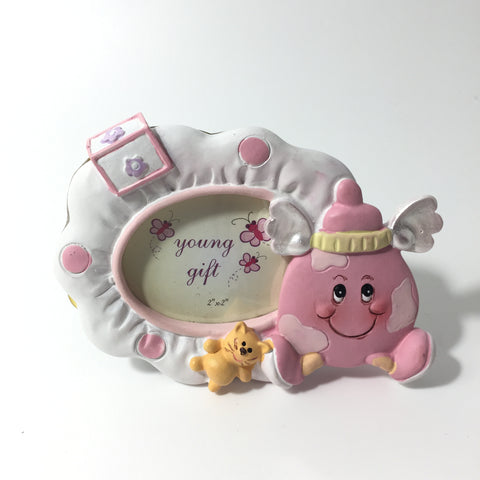 SET 14 CORNICETTE/Portafoto in resina colorata ovale con bibieron in rosa IN OFFERTA.

Dimensione: cm 9.5 x h cm 6.5 (foto interna cm5xh4).

Il prezzo si riferisce all'intero set di 14 cornicett.
Cornicette come bomboniera per la nascita oppure per il battesimo.